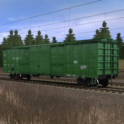 Длинный зелёный крытый вагон